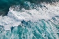 AI-generated illustration of an aerial view of a stunning blue sea with white foamy waves