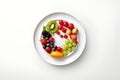 fruit arranged in the shape of a circle on a white plate Royalty Free Stock Photo