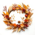 a wreath decorated with wheat and a pumpkin and other autumn items Royalty Free Stock Photo