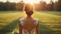 AI generated illustration of the back of a bride standing in the grassy field at sunset