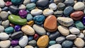 a pile of colorful rocks and pebbles on a beach or pool Royalty Free Stock Photo