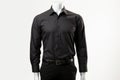 AI generated illustration of a black business shirt with belt on a mannequin Royalty Free Stock Photo