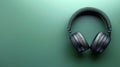 AI generated illustration of a black wireless over-ear headphones on a green background Royalty Free Stock Photo