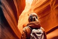 AI generated illustration of a blond female tourist in a canyon