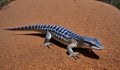 AI-generated illustration of a blue lizard basking on the reddish sand