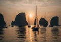 boats are sailing on the calm ocean at sunset in halo halo Royalty Free Stock Photo