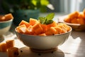 AI generated illustration of a bowl of sliced orange melon cubes on a table
