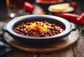 AI generated illustration of a bowl of steaming chili con carne atop a rustic wooden table Royalty Free Stock Photo