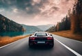 a car driving on a highway near trees and mountains Royalty Free Stock Photo