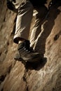 AI-generated illustration of the climber's legs in special rock climbing footwear.