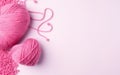 AI generated illustration of a close-up of a ball of pink yarn in a heart shape on a pink background Royalty Free Stock Photo