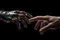 the hands of a humanoid man are touching on top of an artificial hand