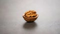 Macro Studio Shot of a Shelled Walnut Half Resting in its Shell Royalty Free Stock Photo