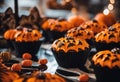 AI generated illustration of a colourful array of Halloween-themed cupcakes Royalty Free Stock Photo
