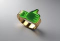 a 3d rendered gold ring with green thumbs up symbol on it