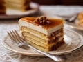 AI generated illustration of a delicious slice of layered caramel cake on a plate with a fork