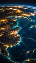 Earth illuminated by lights as seen from a plane at night Royalty Free Stock Photo