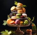 a four tiered display filled with many different types of desserts