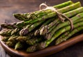 AI generated illustration of fresh asparagus on rustic wooden plate, tied with twine Royalty Free Stock Photo