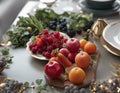 AI generated illustration of fresh berries and apples on a tray on the table