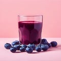 AI-generated illustration of fresh blueberries with a glass of blueberry juice on a pink background Royalty Free Stock Photo