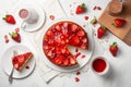 AI generated illustration of A freshly-baked strawberry pie with several slices taken from it