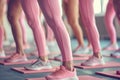 AI generated illustration of girls doing fitness training in the gym, wearing pink yoga pants
