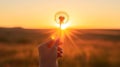 AI generated illustration of a hand holding a dandelion in front of a sunset Royalty Free Stock Photo