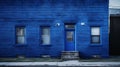 a blue building with a blue door and windows is shown Royalty Free Stock Photo