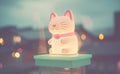 AI generated illustration of a Japanese maneki-neko beckoning cat on a table Royalty Free Stock Photo