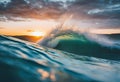 a surfer catching the sun in a wave at sunset on a beach