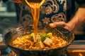 AI generated illustration of a man pouring soup into bowl at restaurant Royalty Free Stock Photo