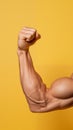 AI generated illustration of a masculine arm on a yellow background