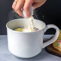 AI generated illustration, mixing the cake mixture with milk into a mug to cook mug cake