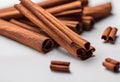 AI generated illustration of multiple cinnamon sticks arranged on a white surface