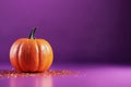 AI generated illustration of an orange glittered pumpkin in front of a purple background