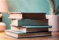 a table topped with a stack of books on top of it Royalty Free Stock Photo