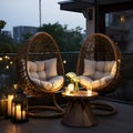 outdoor furniture with some candles and flowers on a patio area