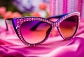 AI-generated illustration of a pair of stylish pink sunglasses with a beaded design along the top