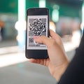 AI-generated illustration of a person scanning a QR code with their smartphone.