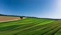 AI generated illustration of a picturesque landscape of rolling hills adorned in green grass Royalty Free Stock Photo