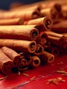 AI-generated illustration of a pile of cinnamon sticks against a vibrant red background