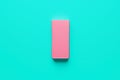 AI-generated illustration of Pink Rubber eraser on bright green background Royalty Free Stock Photo