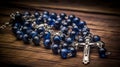 AI generated illustration of a precious blue rosary with a steel cross pendant Royalty Free Stock Photo