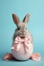 AI generated illustration of a rabbit with a pink bow with an egg Royalty Free Stock Photo