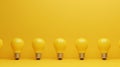 AI generated illustration of a row of yellow light bulbs against a yellow background Royalty Free Stock Photo