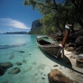 a boat on a sandy beach with trees in the background