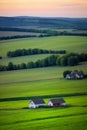 AI generated illustration of a scenic view of rolling green hills and farmland, with farmhouses