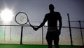 AI generated illustration of a silhouette of a tennis player holding their racquet near the net,