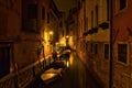 AI generated illustration of small boats docked along a narrow canal in Venice, Italy Royalty Free Stock Photo